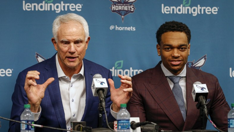 Jun 21, 2019; Charlotte, NC, USA; Charlotte Hornets president of basketball operations Mitch Kupchak, left, talks about 2019 NBA draft pick PJ Washington, right, during a press conference at Spectrum Center. Mandatory Credit: Nell Redmond-USA TODAY Sports