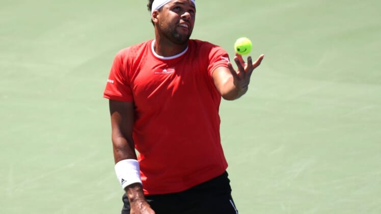 Aug 5, 2019; Montreal, Quebec, Canada; Jo-Wilfried Tsonga from France serves against Jan-Lennard Struff from Germany (not pictured) during the Rogers Cup tennis tournament at Stade IGA. Mandatory Credit: Jean-Yves Ahern-USA TODAY Sports