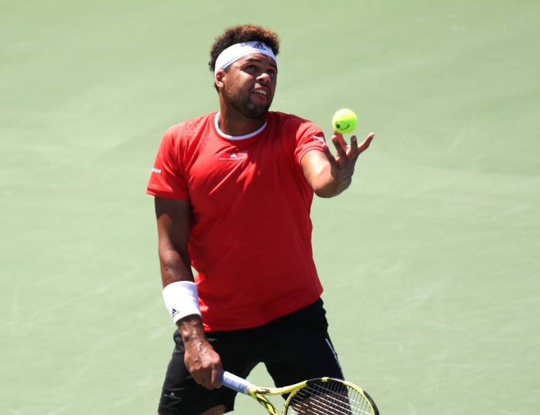 Aug 5, 2019; Montreal, Quebec, Canada; Jo-Wilfried Tsonga from France serves against Jan-Lennard Struff from Germany (not pictured) during the Rogers Cup tennis tournament at Stade IGA. Mandatory Credit: Jean-Yves Ahern-USA TODAY Sports