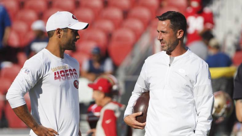 Aug 10, 2019; Santa Clara, CA, USA; San Francisco 49ers quarterback Jimmy Garoppolo (10) and head coach Kyle Shanahan before the game against the Dallas Cowboys at Levi s Stadium. Mandatory Credit: Kelley L Cox-USA TODAY Sports