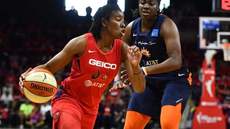 Sep 29, 2019; Washington, DC, USA; Washington Mystics guard Ariel Atkins (7) dribbles the ball against Connecticut Sun forward Shekinna Stricklen (40) during the first quarter in game one of the 2019 WNBA Finals at The Entertainment and Sports Arena. Mandatory Credit: Brad Mills-USA TODAY Sports