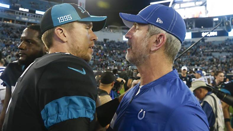 Dec 29, 2019; Jacksonville, Florida, USA; Jacksonville Jaguars quarterback Nick Foles (7) talks with Indianapolis Colts head coach Frank Reich after the game at TIAA Bank Field. Mandatory Credit: Reinhold Matay-USA TODAY Sports