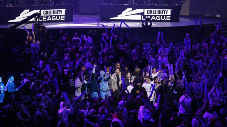 Jan 24, 2020; Minneapolis, Minnesota, USA; Fans cheer for a camera shot of themselves at the start of the Call of Duty League Launch Weekend at The Armory. Mandatory Credit: Bruce Kluckhohn-USA TODAY Sports