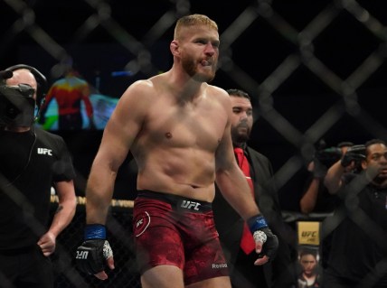 Feb 15, 2020; Rio Rancho, New Mexico, USA; Corey Anderson (red) fights Jan Blachowicz (blue) in the light heavyweight bout during UFC Fight Night at Santa Ana Star Arena. Mandatory Credit: Kirby Lee-USA TODAY Sports
