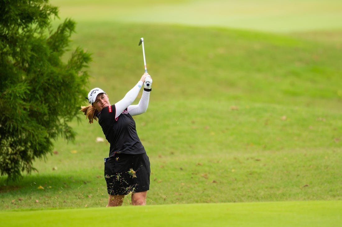 Aug 30, 2020; Rogers, AR, USA; Gemma Dryburgh hits from the rough on the ninth hole during the final round of the Walmart NW Arkansas Championship golf tournament at Pinnacle Country Club. Mandatory Credit: Gunnar Rathbun-USA TODAY Sports
