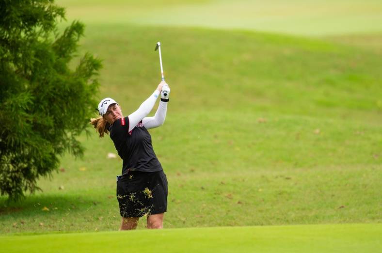 Aug 30, 2020; Rogers, AR, USA; Gemma Dryburgh hits from the rough on the ninth hole during the final round of the Walmart NW Arkansas Championship golf tournament at Pinnacle Country Club. Mandatory Credit: Gunnar Rathbun-USA TODAY Sports