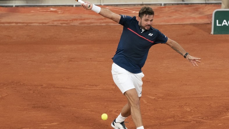 Sep 27, 2020; Paris, France; Stanislas Wawrinka (SUI) in action during his match against Andy Murray (GBR) on day one at Stade Roland Garros. Mandatory Credit: Susan Mullane-USA TODAY Sports