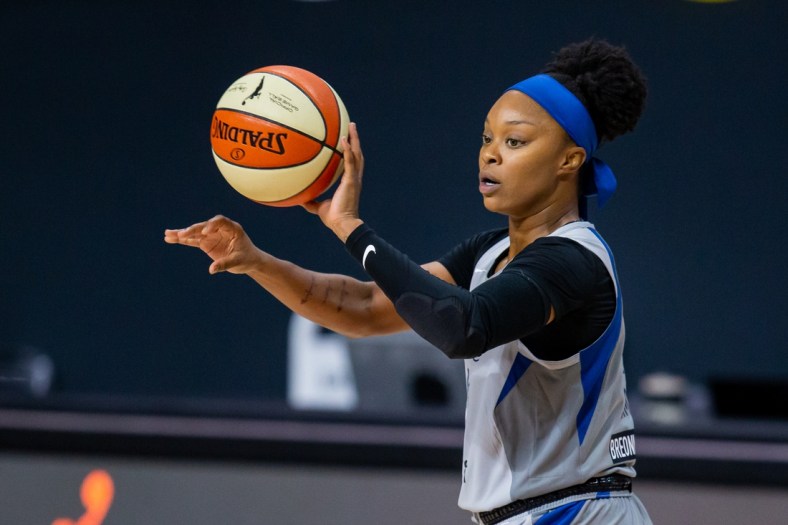 Sep 24, 2020; Bradenton, Florida, USA; Minnesota Lynx guard Odyssey Sims (1) passes the ball during Game 2 of the WNBA Semifinals against the Seattle Storm at Feld Entertainment. Mandatory Credit: Mary Holt-USA TODAY Sports