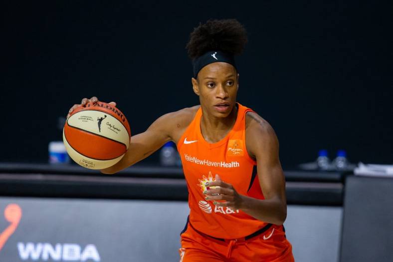 Sep 29, 2020; Bradenton, Florida, USA; Connecticut Sun guard Jasmine Thomas (5) dribbles during game 5 of the WNBA semifinals between the Connecticut Suns and the Las Vegas Aces at IMG Academy. Mandatory Credit: Mary Holt-USA TODAY Sports