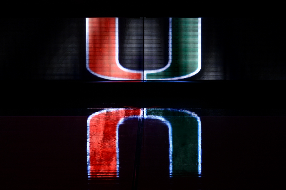 Dec 8, 2020; Coral Gables, Florida, USA; A general view of a reflection of the Miami Hurricanes school logo on the scorers table prior to the game between the Miami Hurricanes and the Purdue Boilermakers at Watsco Center. Mandatory Credit: Jasen Vinlove-USA TODAY Sports