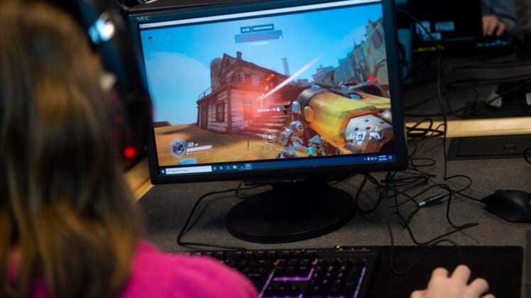 Spring Grove High School esports player Cali Schmidt plays as Roadhog in Overwatch during a practice on Thursday, February, 27, 2020.