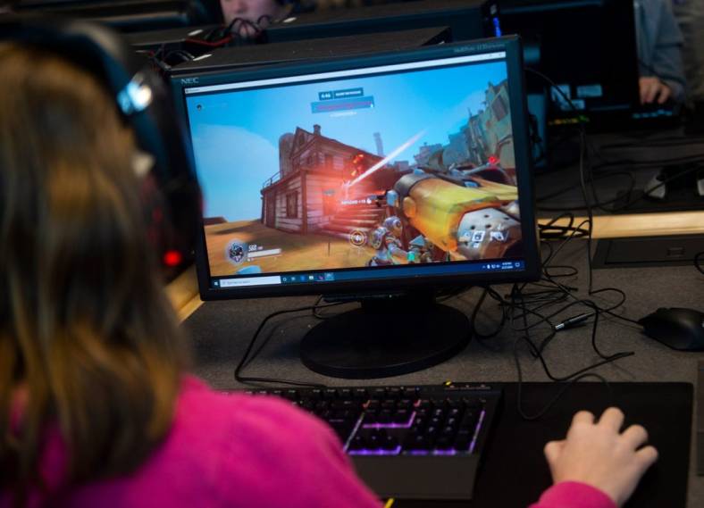Spring Grove High School esports player Cali Schmidt plays as Roadhog in Overwatch during a practice on Thursday, February, 27, 2020.