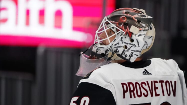 Apr 12, 2021; Denver, Colorado, USA; Arizona Coyotes goaltender Ivan Prosvetov (50) reacts during the second period against the Colorado Avalanche at Ball Arena. Mandatory Credit: Ron Chenoy-USA TODAY Sports