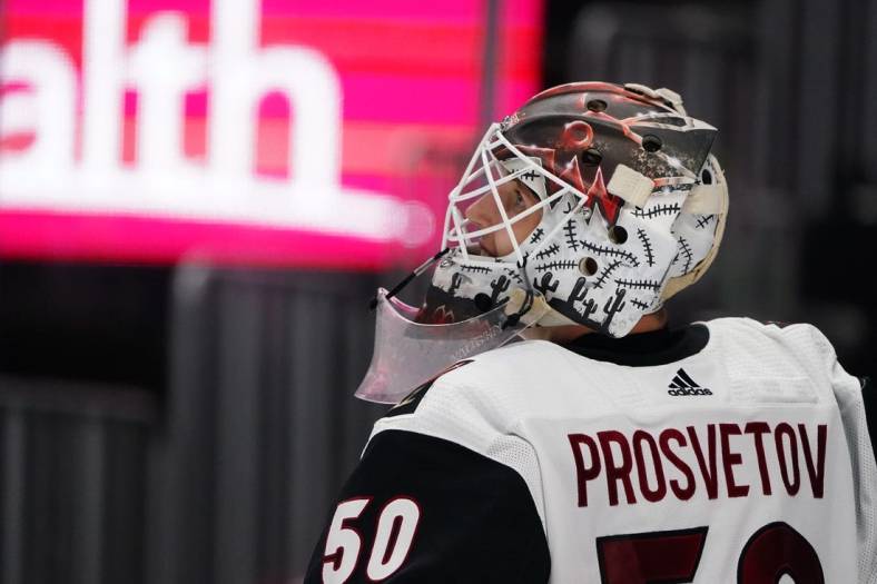 Apr 12, 2021; Denver, Colorado, USA; Arizona Coyotes goaltender Ivan Prosvetov (50) reacts during the second period against the Colorado Avalanche at Ball Arena. Mandatory Credit: Ron Chenoy-USA TODAY Sports