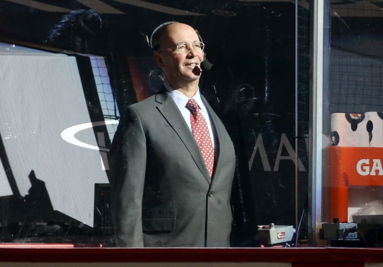 May 8, 2021; Pittsburgh, Pennsylvania, USA;  NBC network NHL hockey analyst Pierre McGuire reports from between the bench before the Pittsburgh Penguins host the Buffalo Sabres at PPG Paints Arena. Mandatory Credit: Charles LeClaire-USA TODAY Sports
