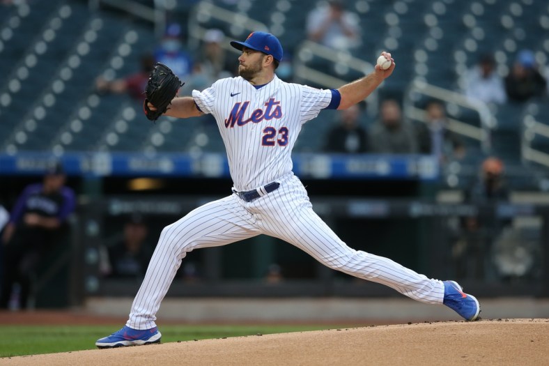 May 24, 2021; New York City, New York, USA; New York Mets starting pitcher David Peterson (23) pitches against the Colorado Rockies during the first inning at Citi Field. Mandatory Credit: Brad Penner-USA TODAY Sports