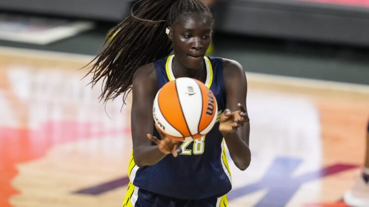 May 27, 2021; College Park, Georgia, USA; Dallas Wings center Awak Kuier (28) passes the ball against the Atlanta Dream during the first half at Gateway Center Arena at College Park. Mandatory Credit: Dale Zanine-USA TODAY Sports