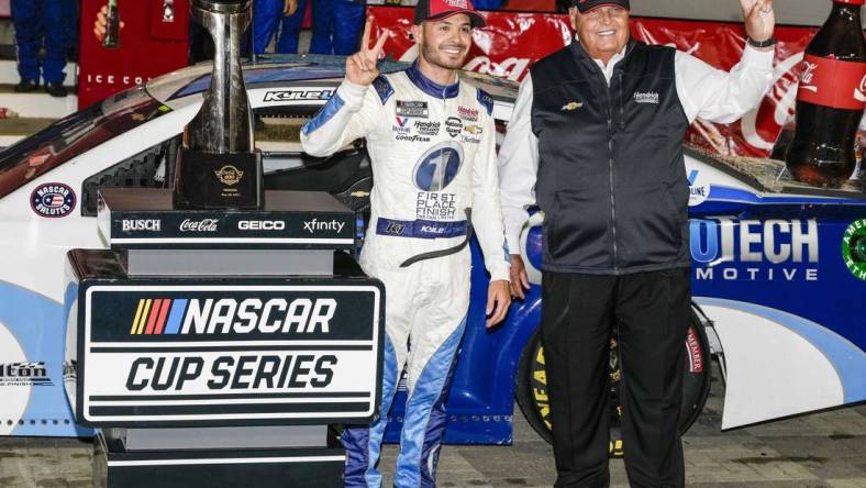 May 30, 2021; Concord, North Carolina, USA;  NASCAR Cup Series driver Kyle Larson (5) celebrates his win with team owner Rick Hendrick at the Coca-Cola 600 at Charlotte Motor Speedway. Mandatory Credit: Jim Dedmon-USA TODAY Sports