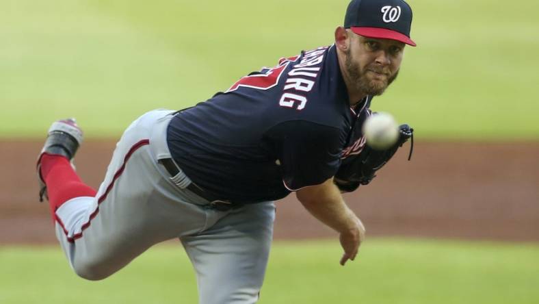 Jun 1, 2021; Atlanta, Georgia, USA; Washington Nationals starting pitcher Stephen Strasburg (37) throws against the Atlanta Braves in the first inning at Truist Park. Mandatory Credit: Brett Davis-USA TODAY Sports