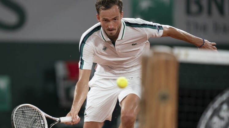 Jun 8, 2021; Paris, France; Daniil Medvedev (RUS) in action during his match against Stefanos Tsitsipas (GRE) on day 10 of the French Open at Stade Roland Garros. Mandatory Credit: Susan Mullane-USA TODAY Sports