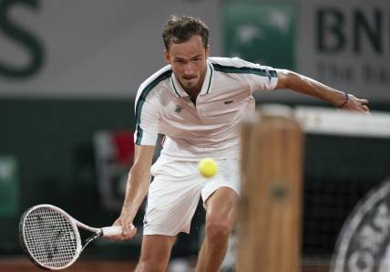 Jun 8, 2021; Paris, France; Daniil Medvedev (RUS) in action during his match against Stefanos Tsitsipas (GRE) on day 10 of the French Open at Stade Roland Garros. Mandatory Credit: Susan Mullane-USA TODAY Sports