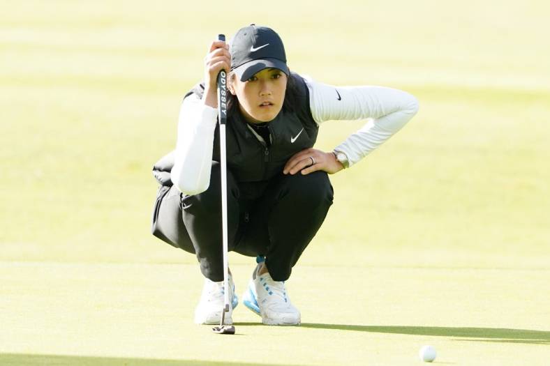June 11, 2021; Daly City, California, USA; Michelle Wie West lines up her putt on the 10th hole during the second round of the LPGA MEDIHEAL Championship golf tournament at Lake Merced Golf Club. Mandatory Credit: Kyle Terada-USA TODAY Sports