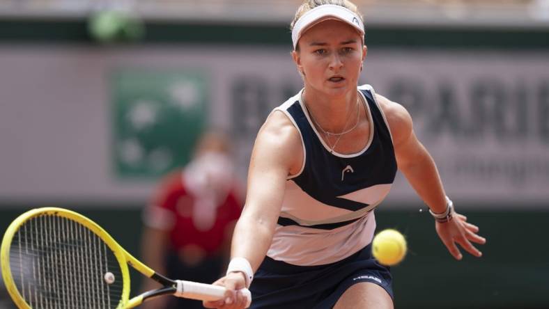 Jun 12, 2021; Paris, France; Barbora Krejcikova (CZE) in action during the women's final match against Anastasia Pavlyuchenkova (RUS) on day 14 of the French Open at Stade Roland Garros. Mandatory Credit: Susan Mullane-USA TODAY Sports