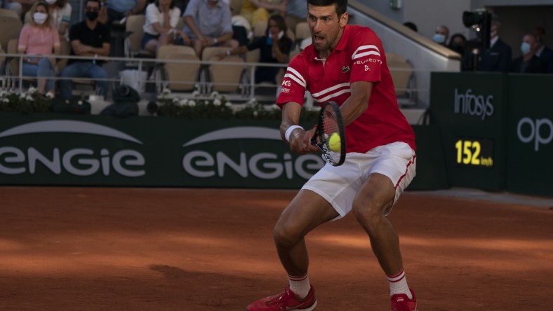 Jun 13, 2021; Paris, France; Novak Djokovic (SRB) in action during the men's final against Stefanos Tsitsipas (GRE) on day 15 of the French Open at Stade Roland Garros. Mandatory Credit: Susan Mullane-USA TODAY Sports