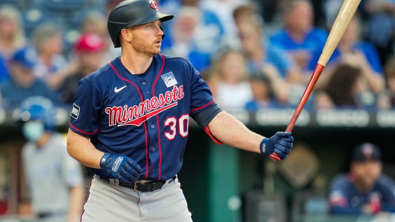 Jun 3, 2021; Kansas City, Missouri, USA; Minnesota Twins center fielder Kyle Garlick (30) bats against the Kansas City Royals during the third inning at Kauffman Stadium. Mandatory Credit: Jay Biggerstaff-USA TODAY Sports