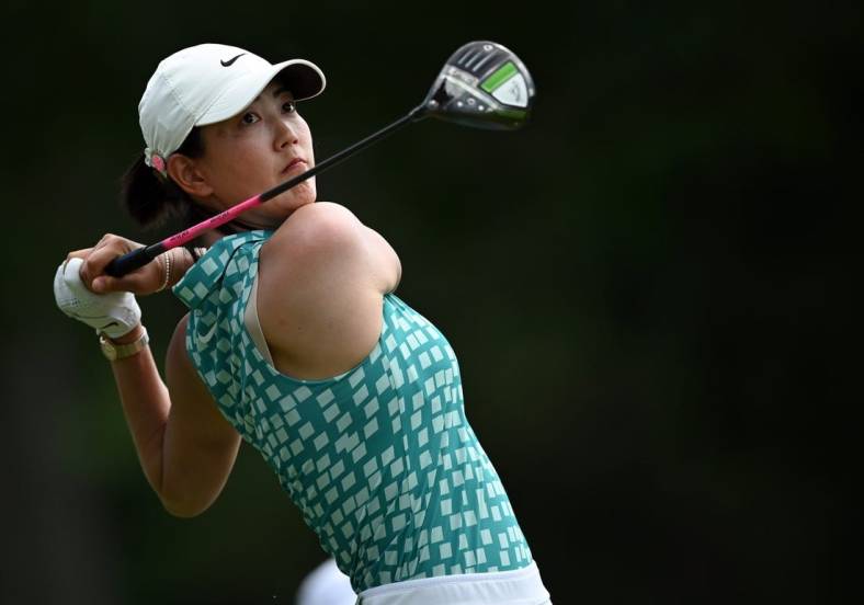 Jun 24, 2021; John's Creek, Georgia, USA; Michelle Wie West plays her shot from the 18th tee during the first round of the KPMG Women's PGA Championship golf tournament at the Atlanta Athletic Club. Mandatory Credit: Adam Hagy-USA TODAY Sports
