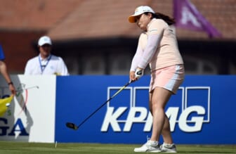 Jun 26, 2021; John's Creek, Georgia, USA; Inbee Park plays her shot from the first tee during the third round of the KPMG Women's PGA Championship golf tournament at the Atlanta Athletic Club. Mandatory Credit: Adam Hagy-USA TODAY Sports