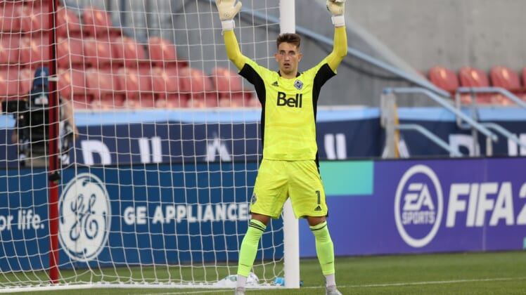 Jul 17, 2021; Sandy, Utah, USA; Vancouver Whitecaps goalkeeper Thomas Hasal (1) instructs his team during the first half of a match against the Los Angeles Galaxy at Rio Tinto Stadium. Mandatory Credit: Rob Gray-USA TODAY Sports