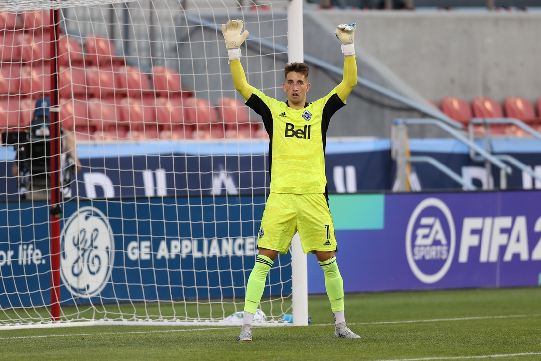 Jul 17, 2021; Sandy, Utah, USA; Vancouver Whitecaps goalkeeper Thomas Hasal (1) instructs his team during the first half of a match against the Los Angeles Galaxy at Rio Tinto Stadium. Mandatory Credit: Rob Gray-USA TODAY Sports