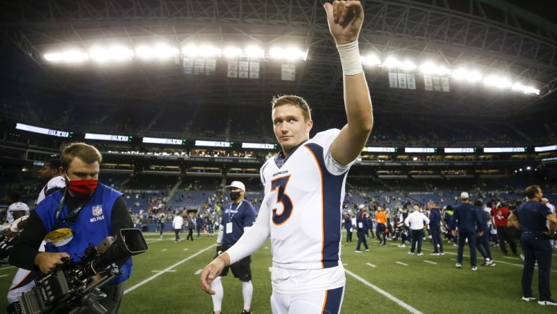 Aug 21, 2021; Seattle, Washington, USA; Denver Broncos quarterback Drew Lock (3) walks to the locker room following a 30-3 victory over the Seattle Seahawks at Lumen Field. Mandatory Credit: Joe Nicholson-USA TODAY Sports