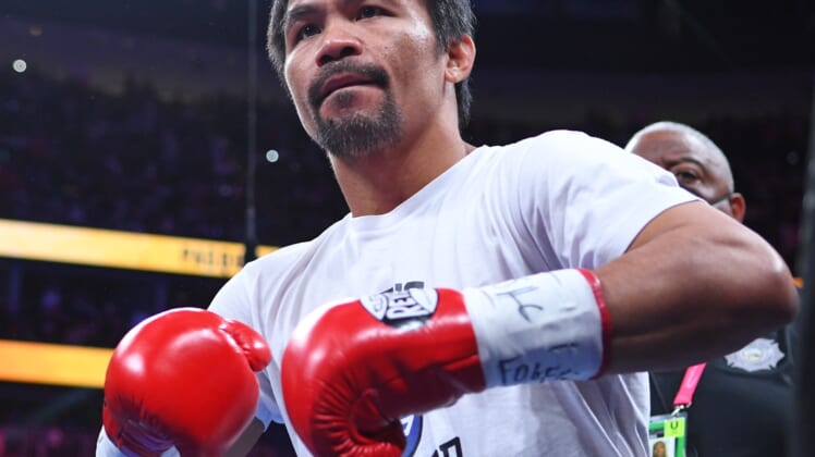 Aug 21, 2021; Las Vegas, Nevada; Manny Pacquiao is pictured before the start of a world welterweight championship bout against Yordenis Ugas at T-Mobile Arena. Mandatory Credit: Stephen R. Sylvanie-USA TODAY Sports
