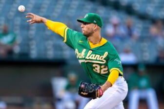 Aug 26, 2021; Oakland, California, USA;  Oakland Athletics starting pitcher James Kaprielian (32) delivers against the New York Yankees during the first inning at RingCentral Coliseum. Mandatory Credit: Neville E. Guard-USA TODAY Sports