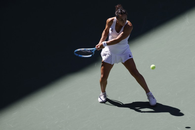 Sep 2, 2021; Flushing, NY, USA; Martina Trevisan of Italy hits a backhand against Belinda Bencic of Switzerland (not pictured) on day four of the 2021 U.S. Open tennis tournament at USTA Billie Jean King National Tennis Center. Mandatory Credit: Geoff Burke-USA TODAY Sports