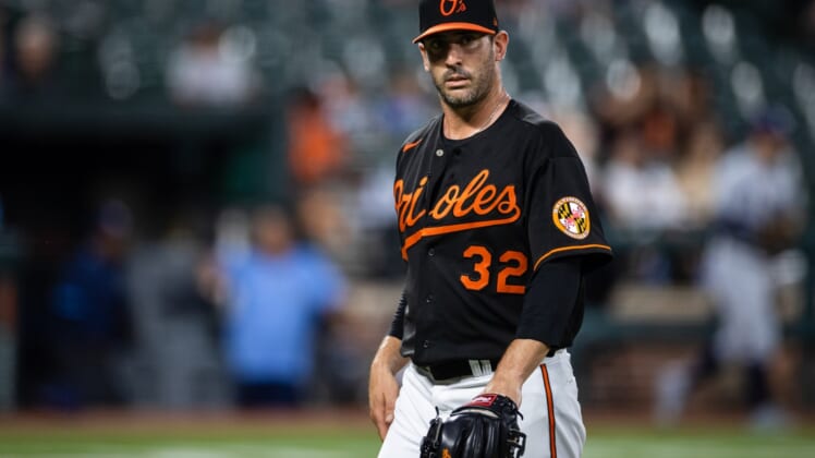 Aug 27, 2021; Baltimore, Maryland, USA; Baltimore Orioles starting pitcher Matt Harvey (32) looks on against the Tampa Bay Rays at Oriole Park at Camden Yards. Mandatory Credit: Scott Taetsch-USA TODAY Sports