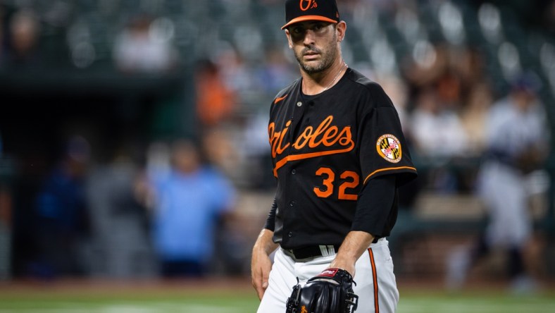 Aug 27, 2021; Baltimore, Maryland, USA; Baltimore Orioles starting pitcher Matt Harvey (32) looks on against the Tampa Bay Rays at Oriole Park at Camden Yards. Mandatory Credit: Scott Taetsch-USA TODAY Sports