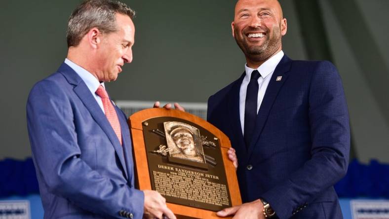 Derek Jeter is presented with his plaque during the 2021 National Baseball Hall of Fame Induction Ceremony on Wednesday, Sept. 8 in Cooperstown. The ceremony honored the members of the Class of 2020: Derek Jeter, Marvin Miller, Ted Simmons and Larry Walker.

Nyuti P 090821 Baseball Hof Induction 45