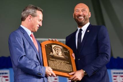 Derek Jeter is presented with his plaque during the 2021 National Baseball Hall of Fame Induction Ceremony on Wednesday, Sept. 8 in Cooperstown. The ceremony honored the members of the Class of 2020: Derek Jeter, Marvin Miller, Ted Simmons and Larry Walker.

Nyuti P 090821 Baseball Hof Induction 45