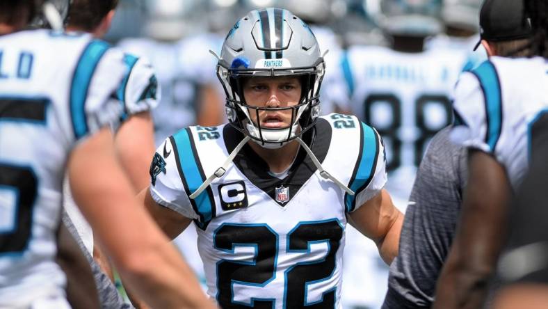 Sep 19, 2021; Charlotte, North Carolina, USA;  Carolina Panthers running back Christian McCaffrey (22) comes on to the field before the game at Bank of America Stadium. Mandatory Credit: Bob Donnan-USA TODAY Sports