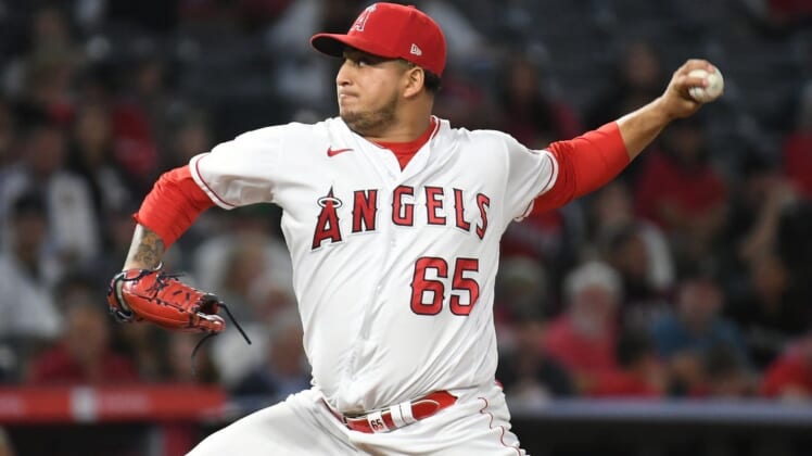 Sep 24, 2021; Anaheim, California, USA; Los Angeles Angels relief pitcher Jose Quijada (65) pitches against the Seattle Mariners in the sixth inning at Angel Stadium. Mandatory Credit: Richard Mackson-USA TODAY Sports