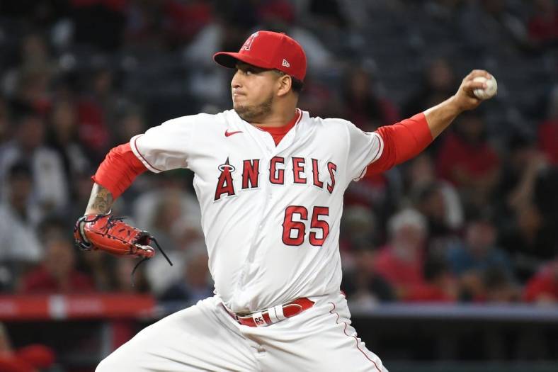 Sep 24, 2021; Anaheim, California, USA; Los Angeles Angels relief pitcher Jose Quijada (65) pitches against the Seattle Mariners in the sixth inning at Angel Stadium. Mandatory Credit: Richard Mackson-USA TODAY Sports