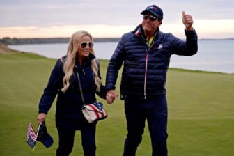 Sep 25, 2021; Haven, Wisconsin, USA; Team USA vice-captain Phil Mickelson and his wife Amy Mickelson on the 17th green during day two four-ball rounds for the 43rd Ryder Cup golf competition at Whistling Straits. Mandatory Credit: Orlando Ramirez-USA TODAY Sports