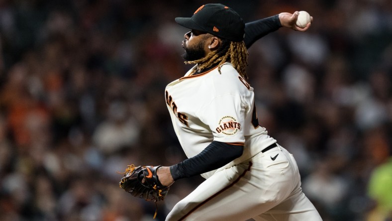 Sep 30, 2021; San Francisco, California, USA; San Francisco Giants starting pitcher Johnny Cueto (47) throws against the Arizona Diamondbacks in the third inning at Oracle Park. Mandatory Credit: John Hefti-USA TODAY Sports