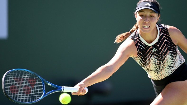 Oct 12, 2021; Indian Wells, CA, USA; Jessica Pegula (USA) hits a shot against Elina Svitolina (UKR) during a fourth round match match in the BNP Paribas Open at the Indian Wells Tennis Garden. Mandatory Credit: Jayne Kamin-Oncea-USA TODAY Sports