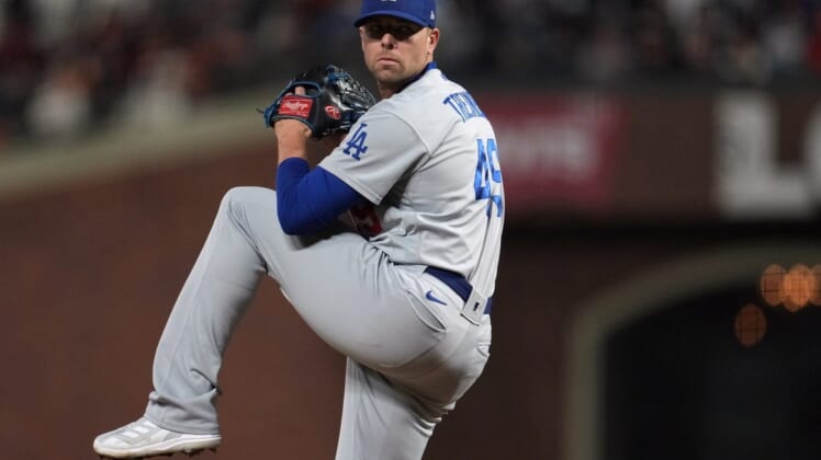 Oct 14, 2021; San Francisco, California, USA; Los Angeles Dodgers relief pitcher Blake Treinen (49) throws against the San Francisco Giants during the seventh inning in game five of the 2021 NLDS at Oracle Park. Mandatory Credit: Neville E. Guard-USA TODAY Sports