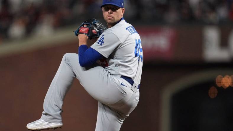 Oct 14, 2021; San Francisco, California, USA; Los Angeles Dodgers relief pitcher Blake Treinen (49) throws against the San Francisco Giants during the seventh inning in game five of the 2021 NLDS at Oracle Park. Mandatory Credit: Neville E. Guard-USA TODAY Sports