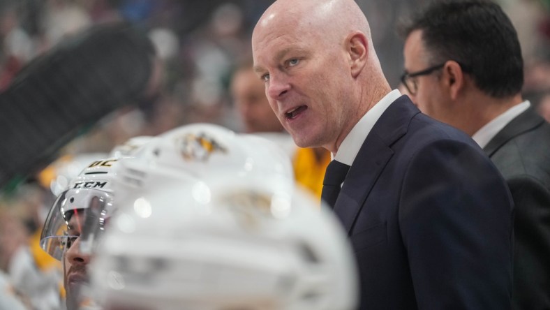 Oct 24, 2021; Saint Paul, Minnesota, USA; Nashville Predators head coach John Hynes looks on during the third period against the Minnesota Wild at Xcel Energy Center. Mandatory Credit: Brace Hemmelgarn-USA TODAY Sports